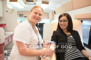 Donor giving blood during the Unity in the Community Blood Drive hosted by the World Mission Society Church of God