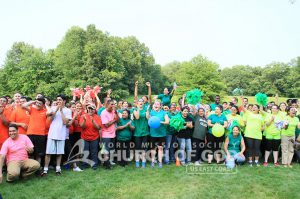 Group photo of World Mission Society Church of God members laughing during the Rally to Be Like Isaac