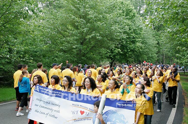 World Mission Society Church of God volunteers walking and cheering during the 2011 Walk Now for Autism Speaks