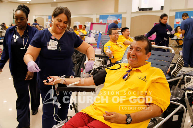 east coast mega blood drive 2016, world mission society church of god, new windsor, yellow shirt, volunteer