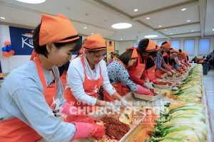 World Mission Society Church of God members and guests making kimchi during the Hudson Valley Kimchi Festival 2016
