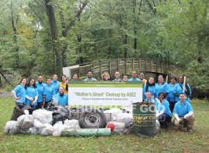 Group photo of ASEZ volunteers from the World Mission Society Church of God after Mothers Street cleanup at Contant Park