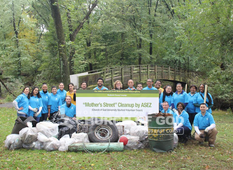Group photo of ASEZ volunteers from the World Mission Society Church of God after Mothers Street cleanup at Contant Park