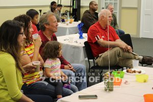 World Mission Society Church of God and guests laughing during Father's Day Appreciation Event 2015 in Hudson, NH