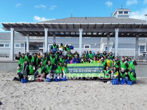 Group photo of World Mission Society Church of God volunteers after Hampton Beach cleanup