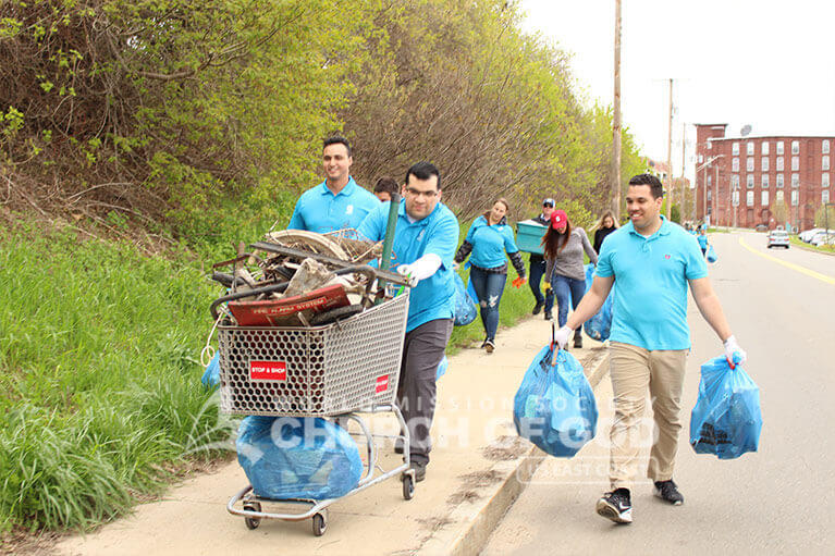 ASEZ volunteers removing trash from alongside Allard Drive in Manchester, NH