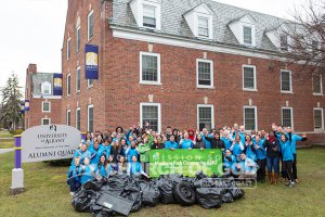 Group photo of ASEZ volunteers from UAlbany and other colleges during their Madison Park cleanup.