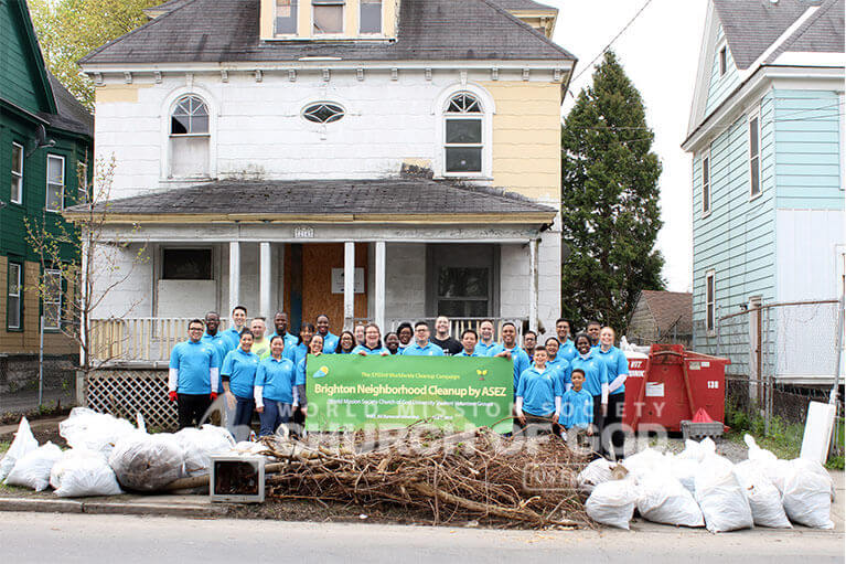 ASEZ members taking a group photo at the end of their vacant property cleanup in Syracuse, NY