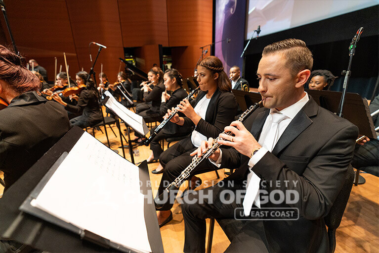 The winds section of the Church of God Orchestra performing at the Lincoln Center on August 11