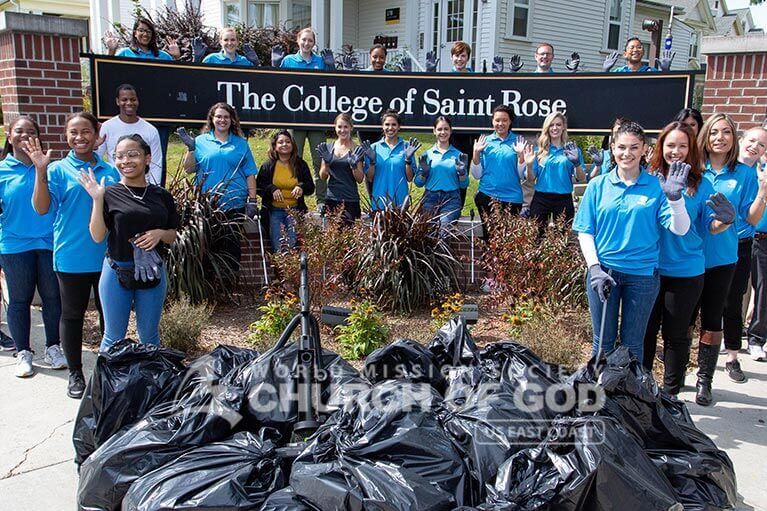 ASEZ student volunteers group photo with the garbage they collected in front of the College of Saint Rose.