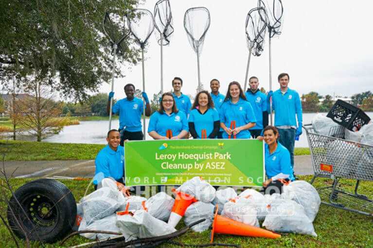 Group photo of ASEZ volunteers at their Leroy Hoequist Park cleanup.