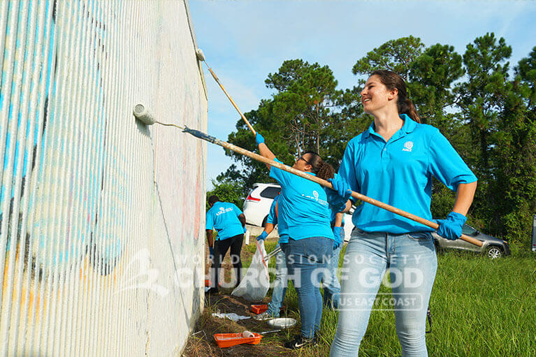 ASEZ volunteers painting over graffiti 