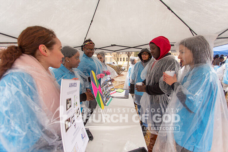 ASEZ volunteers in Albany explained their initiatives during their cleanup at Madison Park.