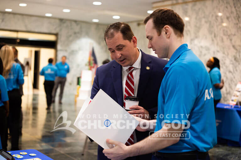 ASEZ member giving out information about ASEZ